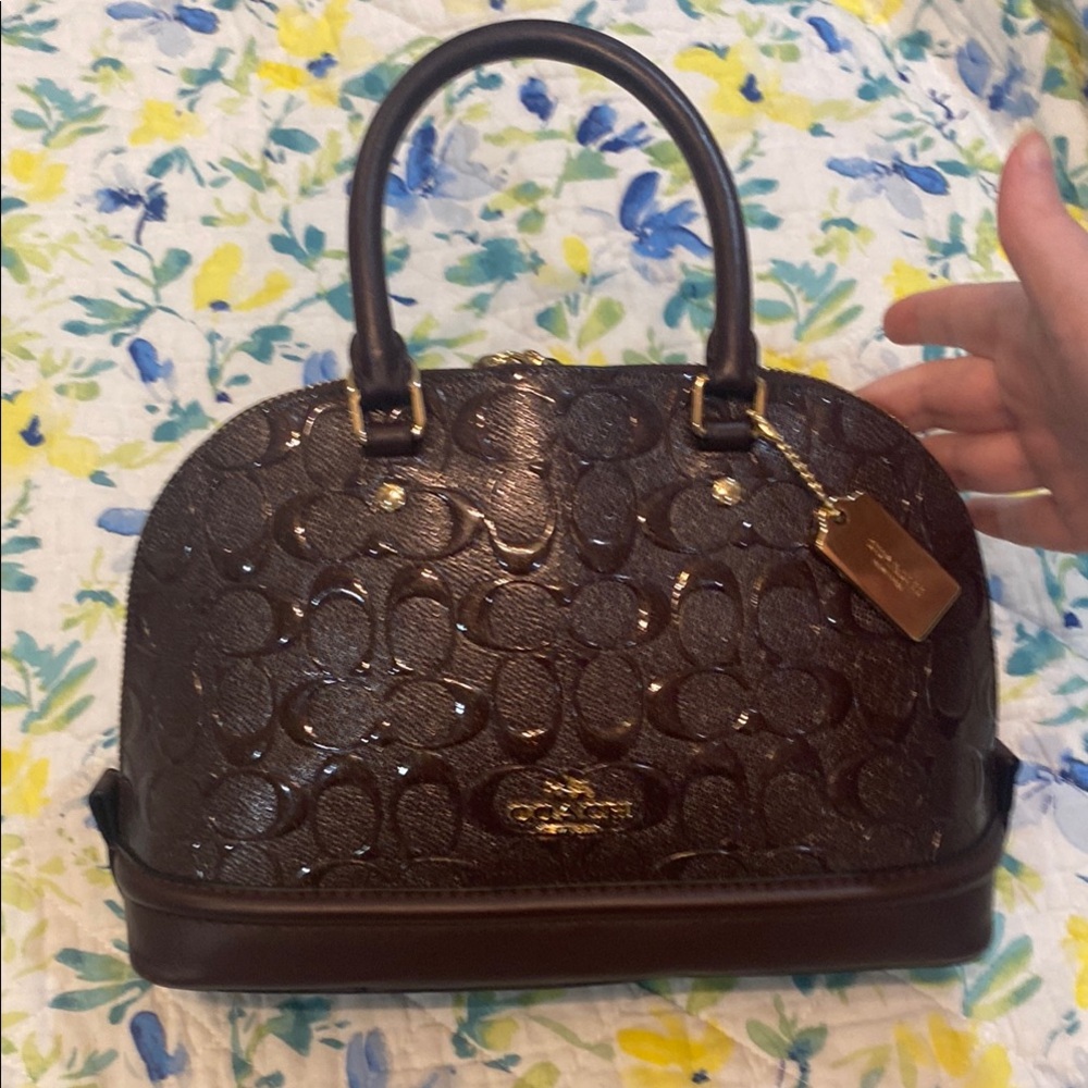 Coach Brown Leather Satchel with Signature Embossed Pattern